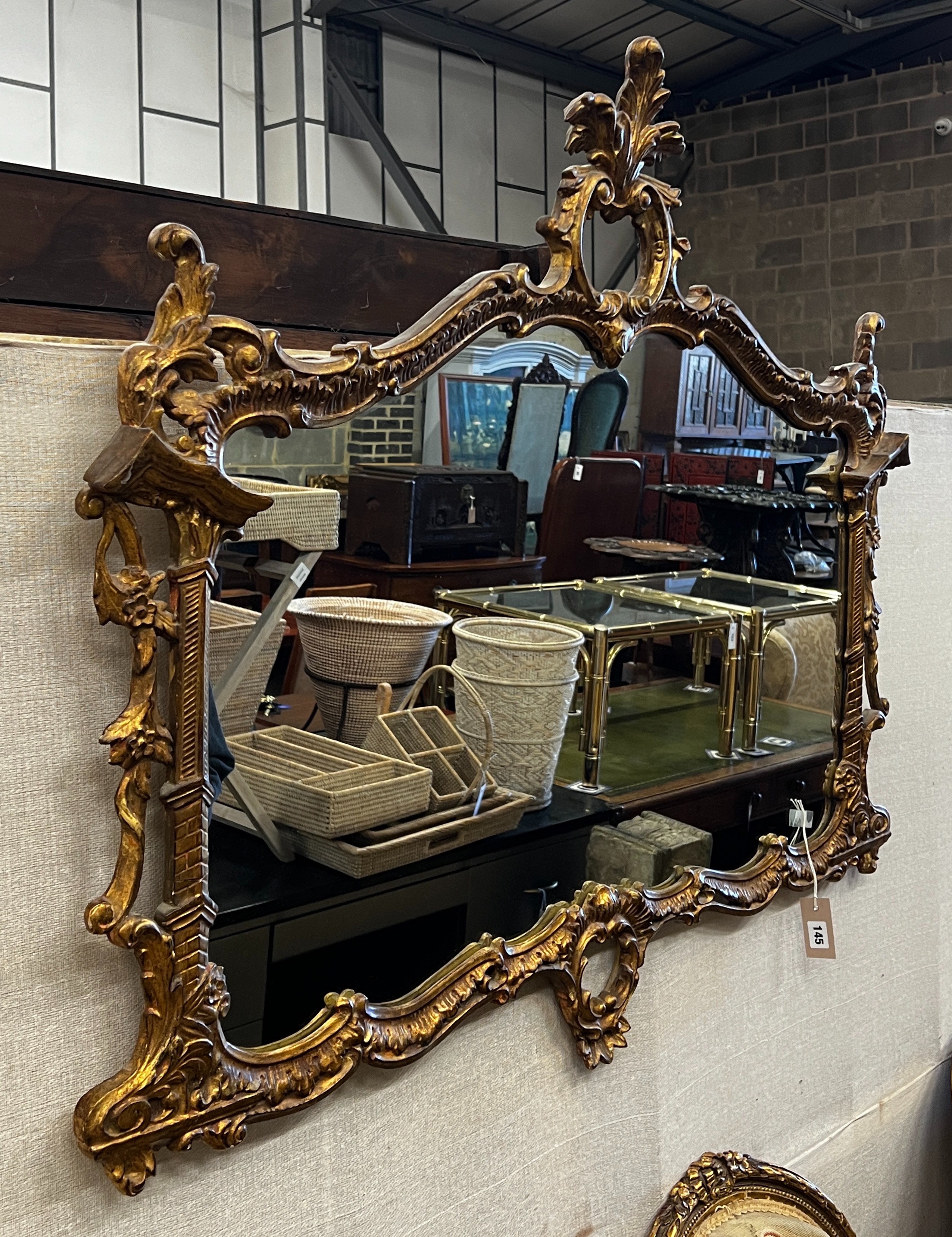 A Chinese Chippendale style giltwood framed and composition rectangular wall mirror, width 116cm, height 99cm